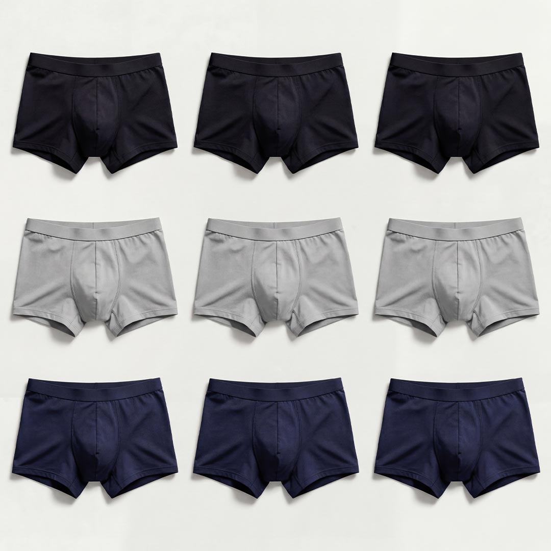 Orykas Everyday Colours Set — 9 men's incontinence underwear in black, grey and navy — pack front view