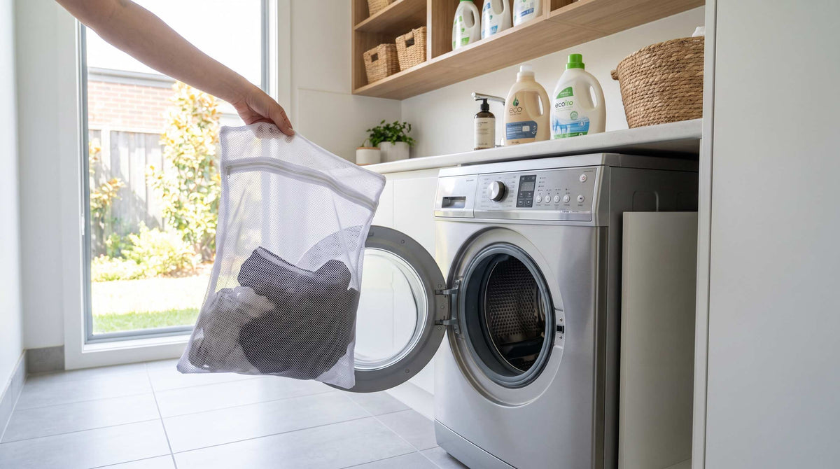 Washing incontinence underwear in mesh bag in Australian laundry room