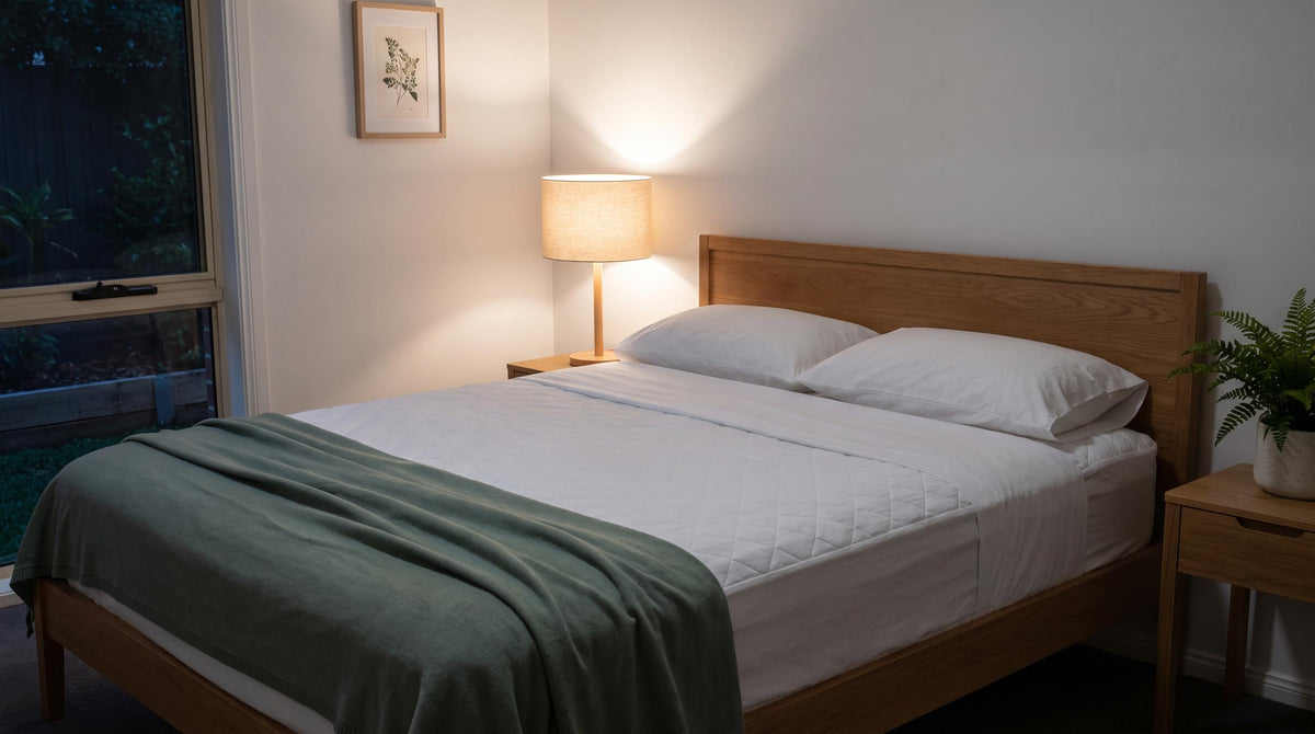 Australian bedroom with washable bed pad for nighttime incontinence protection